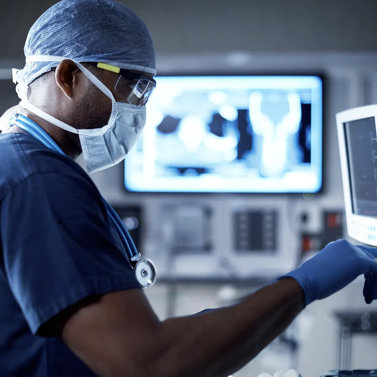 Surgeon working on a computer